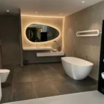 Miroir ovale rétroéclairé avec bouton tactile