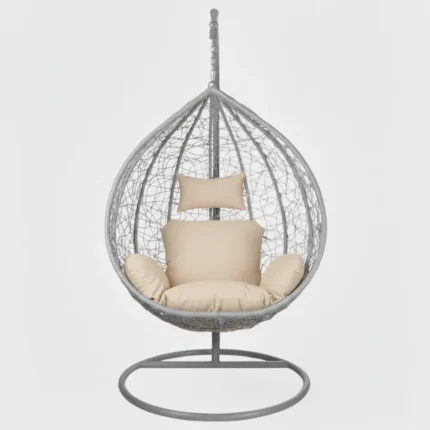 Balançoire Aéris vue de face avec coussins beige sur fond blanc, cadre métal gris clair, déco intérieure moderne au Maroc