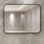 miroir rectangulaire à coins arrondis avec cadre en métal antirouille posé horizontalement, vue rapprochée, design moderne pour salon ou salle de bain