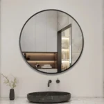 miroir rond avec cadre en métal antirouille vu en face, design moderne pour salle de bain, salon ou chambre